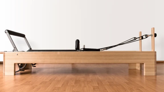 Clinical Pilates session using mat and small equipment