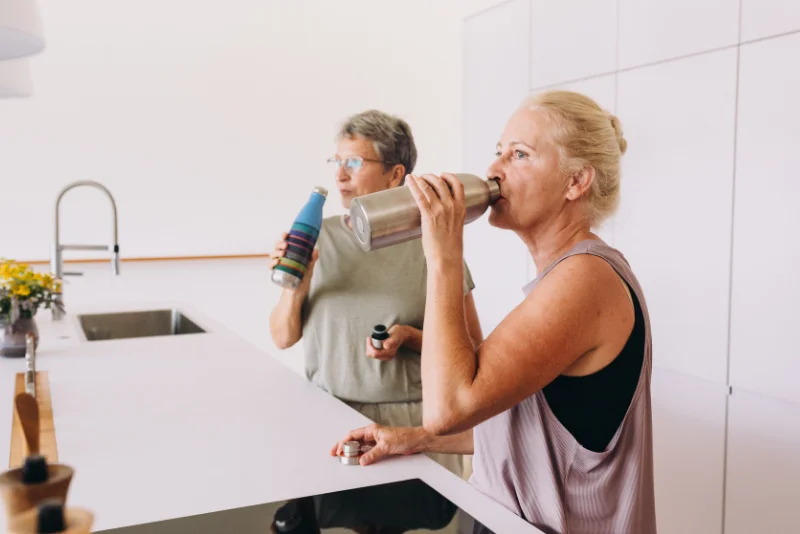 Woman staying hydrated as part of a healthy routine